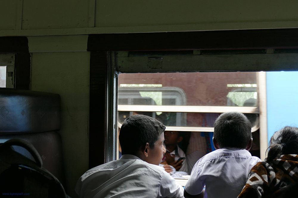 School boys on a train from Haputale to Nuwara Eliya