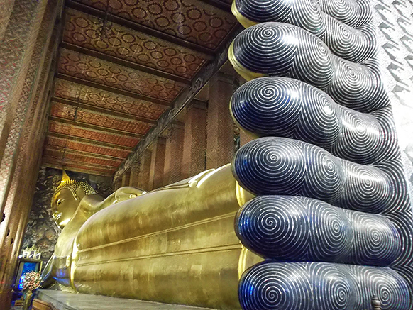 Reclining Buddha at Wat Pho that can be easily visited during 24 hours in Bangkok